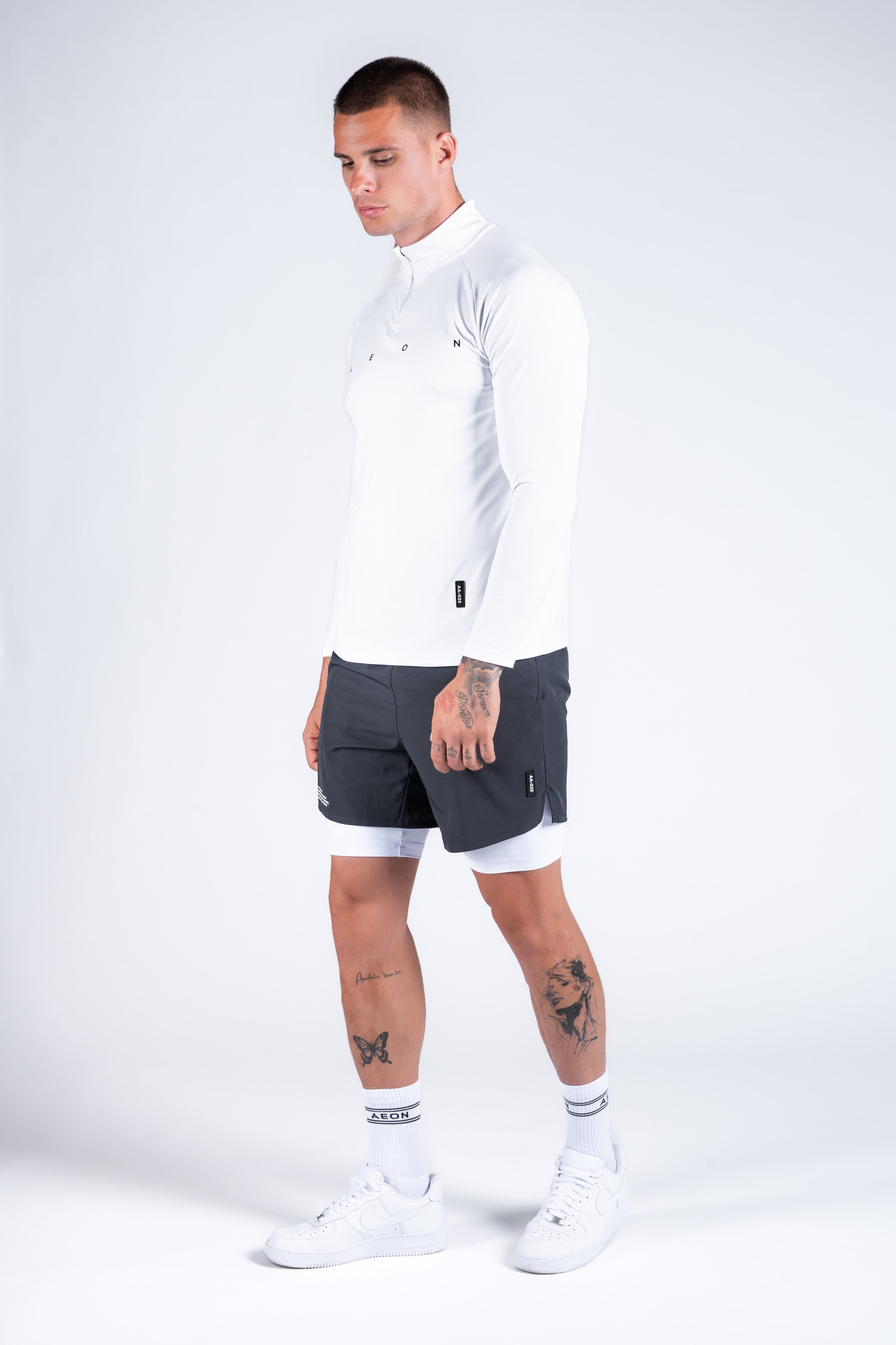 ICON PERFORMANCE HALF ZIP TEE